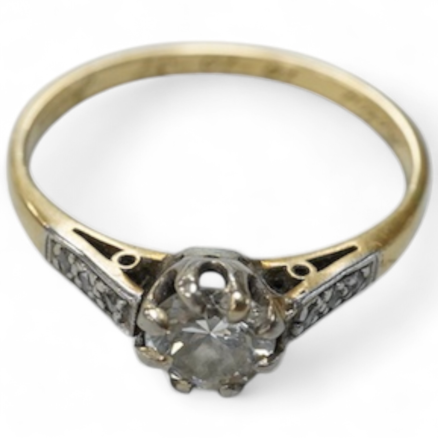 A diamond ring, mid 20th century, claw-set with a circular-cut diamond weighing approximately 0.50 carats, to shoulders set with single-cut diamonds, mounted in gold, size O, inscribed 'Molly 16-10-37 John', gross weight